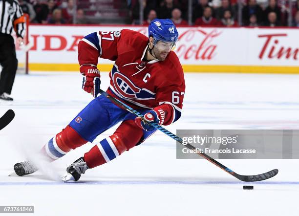 Max Pacioretty of the Montreal Canadiens skates with the puck against the New York Rangers in Game Five of the Eastern Conference Quarterfinals...