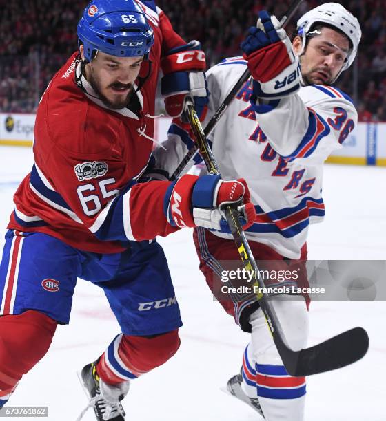 Andrew Shaw of the Montreal Canadiens skates against Mats Zuccarello of the New York Rangers in Game Five of the Eastern Conference Quarterfinals...