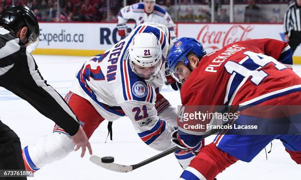 Tomas Plekanec of the Montreal Canadiens faces off against Derek Stepan of the New York Rangers in Game Five of the Eastern Conference Quarterfinals...