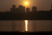 Morning sunrise in the city lake