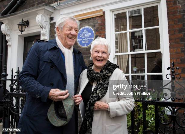 Dame Judi Dench and Sir Ian McKellen during the unveiling of a new plaque commemorating her friend and fellow actor Sir John Gielgud on Cowley Street...