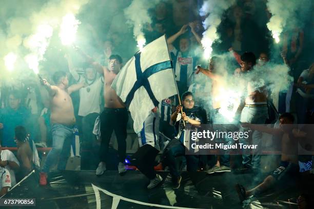 Fans of Pachuca light flares to celebrate after winning the Final second leg match between Pachuca and Tigres UANL as part of the CONCACAF Champions...