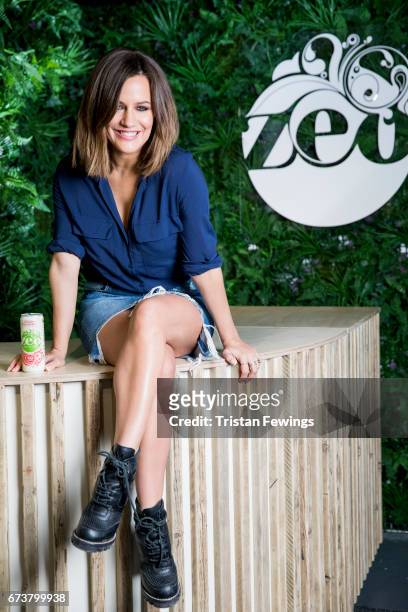 Caroline Flack poses for pictures at the opening of the Zeo Dry Bar in Old Street on April 27, 2017 in London, England.Heathy soft drink brand Zeo is...