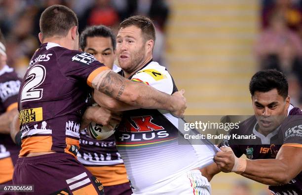 Trent Merrin of the Panthers takes on the defence during the round nine NRL match between the Brisbane Broncos and the Penrith Panthers at Suncorp...