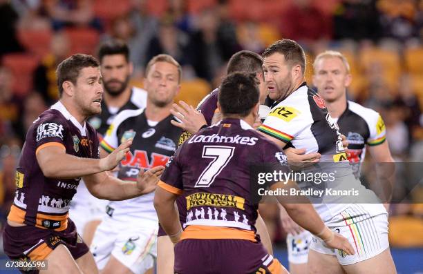 Trent Merrin of the Panthers takes on the defence during the round nine NRL match between the Brisbane Broncos and the Penrith Panthers at Suncorp...