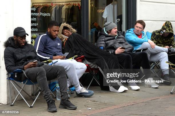 Fans camp outside fashion retailer 18montrose in Nottingham for the Adidas Yeezy Boost 350 V2 trainers, the latest footwear to be released by...