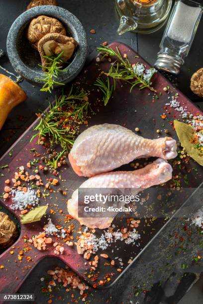raw chicken with spices - drumstick stock pictures, royalty-free photos & images