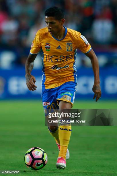 Javier Aquino of Tigres drives the ball during the Final second leg match between Pachuca and Tigres UANL as part of the CONCACAF Champions League...