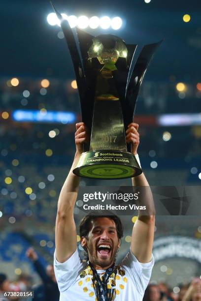 Omar Gonzalez of Pachuca lifts the trophy to celebrate after winning the Final second leg match between Pachuca and Tigres UANL as part of the...