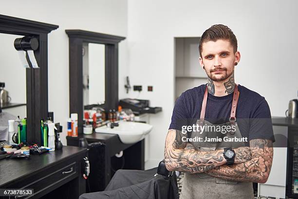 british hipster barber shop owner stood proudly - barber fotografías e imágenes de stock