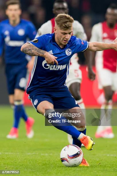 Max Meyer of Schalke , controls the ball during the UEFA Europa League Quarter Final first leg match between Ajax Amsterdam and FC Schalke 04 at...