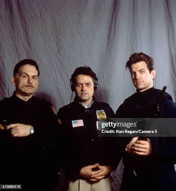 Director Jonathan Demme and actors Danny Darst and Chris Isaak are photographed on the set of 'The Silence of the Lambs' in 1989 around Pittsburgh,...