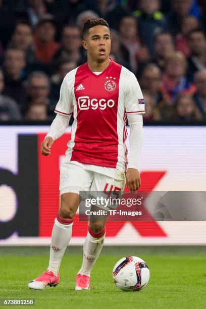 Justin Kluivert of Ajax Amsterdam , controls the ball during the UEFA Europa League Quarter Final first leg match between Ajax Amsterdam and FC...