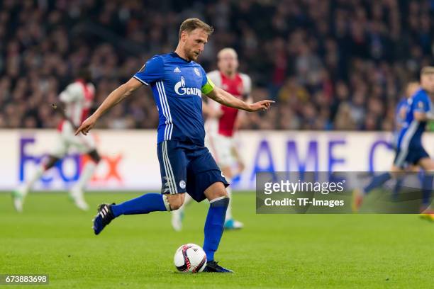 Benedikt Hoewedes of Schalke , controls the ball during the UEFA Europa League Quarter Final first leg match between Ajax Amsterdam and FC Schalke 04...
