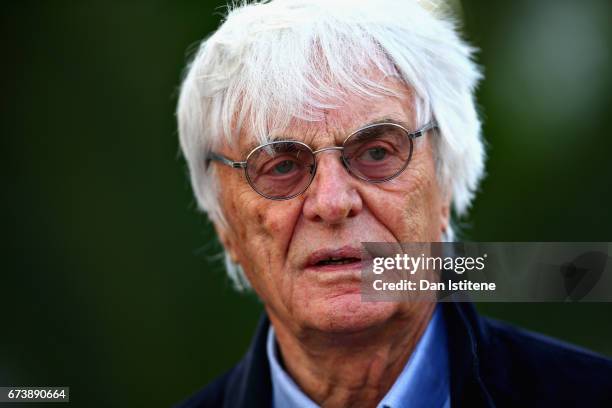 Bernie Ecclestone, Chairman Emeritus of the Formula One Group walks in the Paddock during previews to the Formula One Grand Prix of Russia on April...