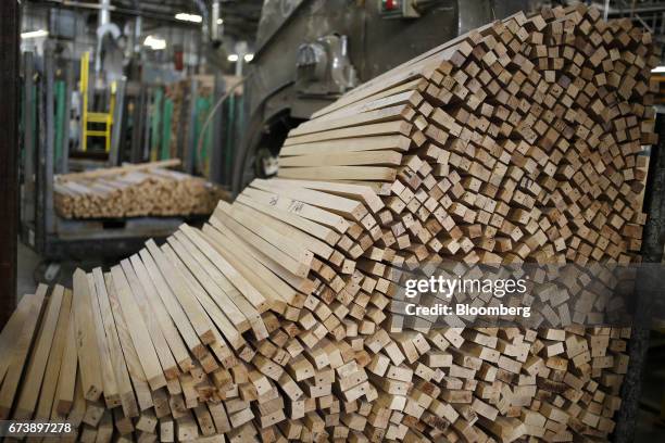 White oak barrel staves sit stacked before being manufactured into bourbon barrels at the Brown-Forman Corp. Cooperage facility in Louisville,...