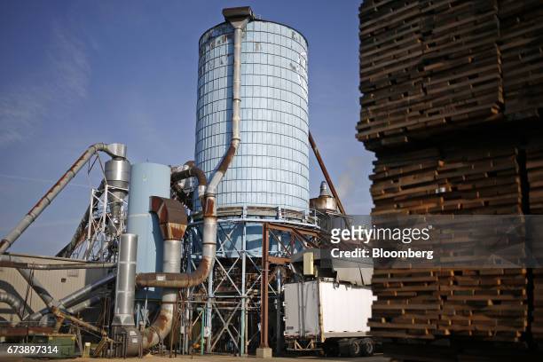 Pieces of white oak sit stacked before being manufactured into bourbon barrels at the Brown-Forman Corp. Cooperage facility in Louisville, Kentucky,...
