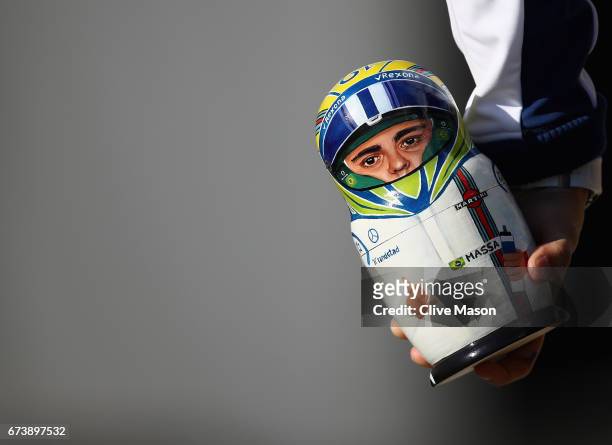Felipe Massa of Brazil and Williams holds a Russian doll with his face one during previews to the Formula One Grand Prix of Russia on April 27, 2017...