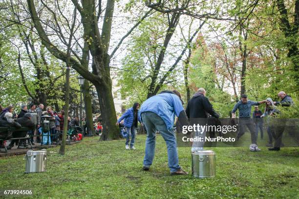 Homeless people and volunteers play football match during 'Soup on Planty' event at Planty park in Krakow, Poland on 27 April, 2017. 'Soup on Planty'...