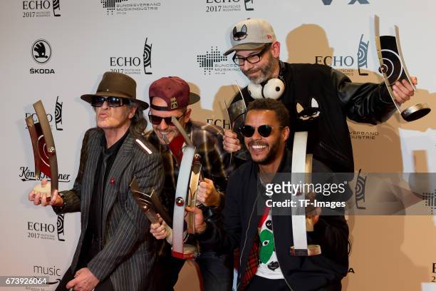 Udo Lindenberg and Beginner poses with her award during the ECHO German Music Award in Berlin, Germany on April 06, 2017.