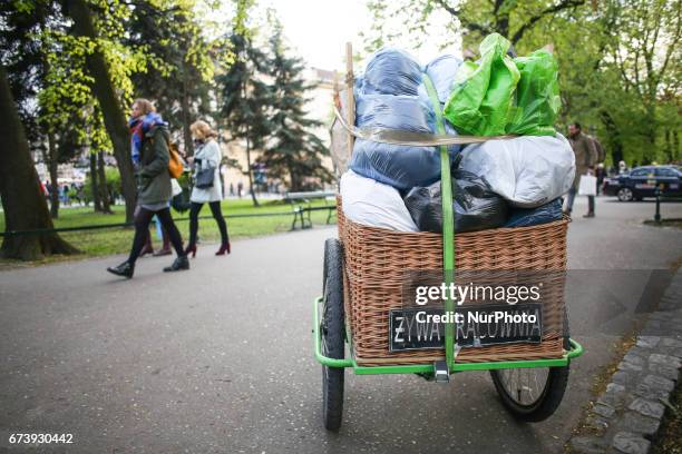 Basket with clothes for homeless people during &quot;Soup on Planty&quot; event at Planty park in Krakow, Poland on 27 April, 2017. &quot;Soup on...