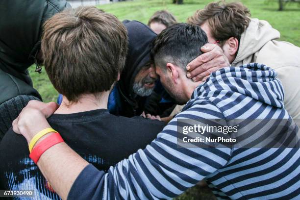 Homeless people and volunteers play football match during 'Soup on Planty' event at Planty park in Krakow, Poland on 27 April, 2017. 'Soup on Planty'...