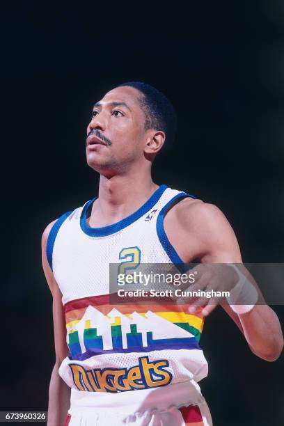Alex English of the Denver Nuggets looks on against the Atlanta Hawks during a game played circa 1990 at the Omni in Atlanta, Georgia. NOTE TO USER:...