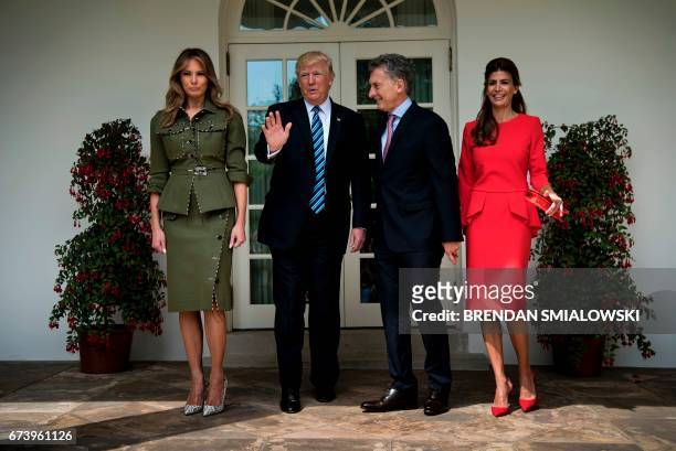 First Lady Melania Trump, US President Donald Trump, Argentina's President Mauricio Macri, and Argentina's First Lady Juliana Awada pose outside the...