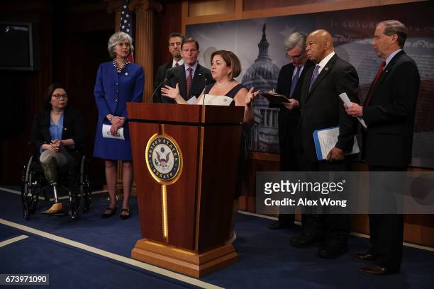 Rep. Linda Sanchez speaks as Sen. Tammy Duckworth , Rep. Katherine Clark , Rep. John Sarbanes , Sen. Richard Blumenthal , Sen. Sheldon Whitehouse ,...