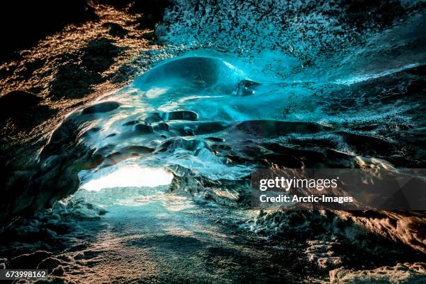 ice cave. the crystal cave, breidamerkurjokull glacier, iceland - crystal caves stock-fotos und bilder