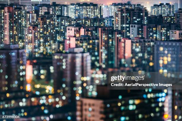 living apartment in beijing at night - explosão demográfica imagens e fotografias de stock