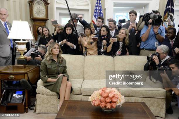 First Lady Melania Trump attends a meeting with U.S. President Donald Trump, and Mauricio Macri, Argentina's president, not pictured, in the Oval...