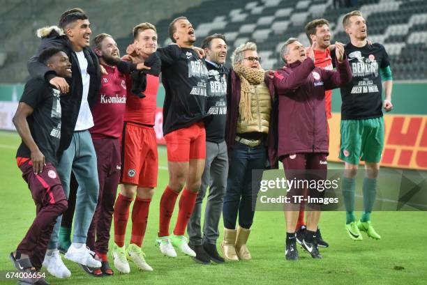 Players of Frankfurt celebrates with a team after during the DFB Cup semi final match between Borussia Moenchengladbach and Eintracht Frankfurt at...