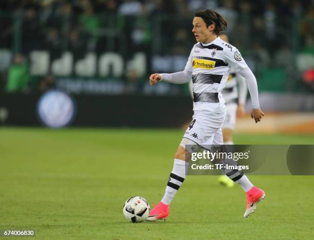 Nico Schulz of Moenchengladbach controls the ball during the DFB Cup semi final match between Borussia Moenchengladbach and Eintracht Frankfurt at...