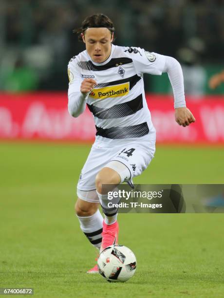 Nico Schulz of Moenchengladbach controls the ball during the DFB Cup semi final match between Borussia Moenchengladbach and Eintracht Frankfurt at...