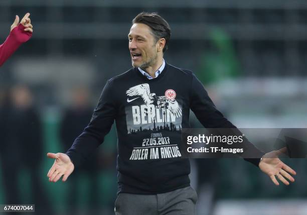 Head coach Niko Kovac of Frankfurt elebrates with a team after the DFB Cup semi final match between Borussia Moenchengladbach and Eintracht Frankfurt...