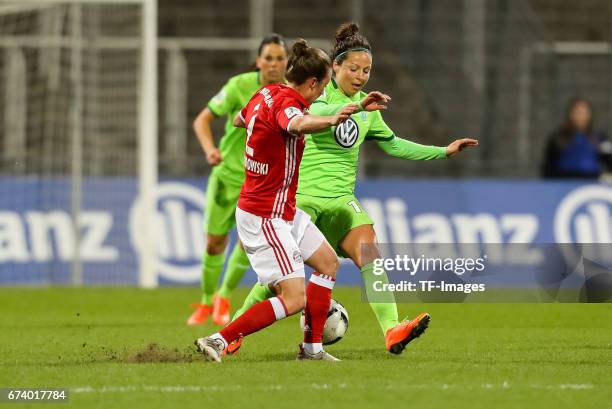 Gina Lewandowski of Munich and Vanessa Bernauer of Wolfsburg battle for the ball during the Women's DFB Cup Quarter Final match between FC Bayern...