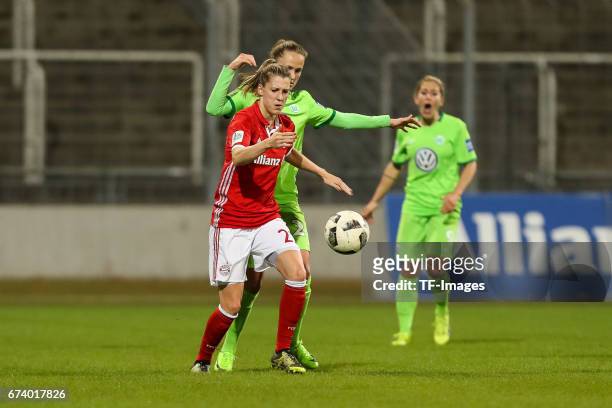 Verena Faisst of Munich and Caroline Graham Hansen of Wolfsburg battle for the ball during the Women's DFB Cup Quarter Final match between FC Bayern...