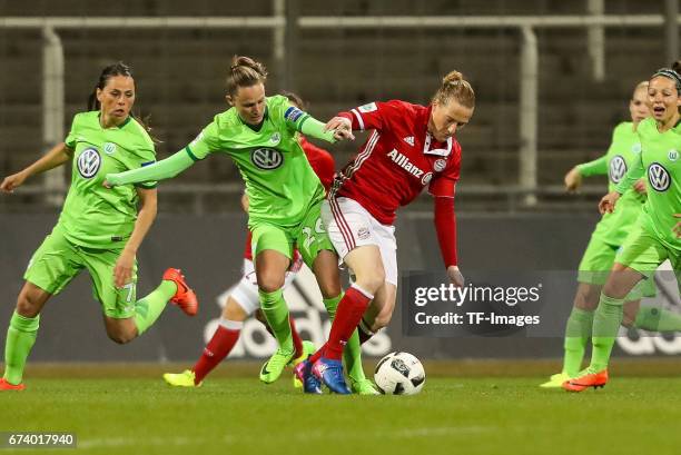 Caroline Graham Hansen of Wolfsburg and Melanie Behringer of Munich battle for the ball during the Women's DFB Cup Quarter Final match between FC...