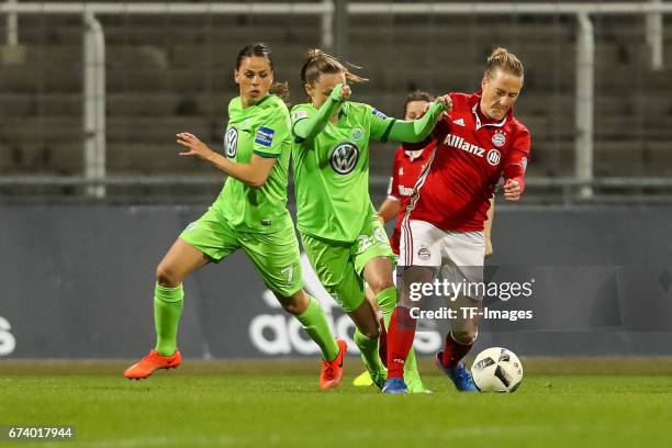 Caroline Graham Hansen of Wolfsburg and Melanie Behringer of Munich battle for the ball during the Women's DFB Cup Quarter Final match between FC...