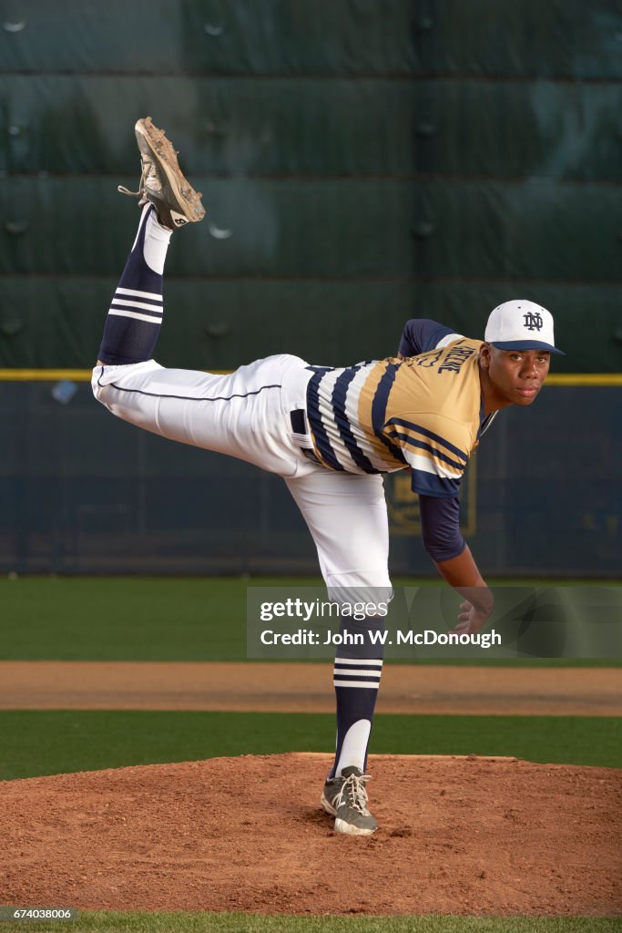 Portrait of Notre Dame HS Hunter Greene posing in action on mound