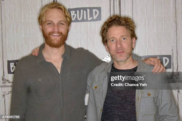 Wyatt Russell and Jeff Grace attend Build series to discuss "Folk Hero & Funny Guy" at Build Studio on April 27, 2017 in New York City.