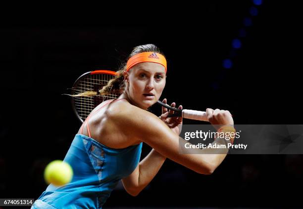 Kristina Mladenovic of France plays a backhand during her match against Angelique Kerber of Germany during the Porsche Tennis Grand Prix at Porsche...