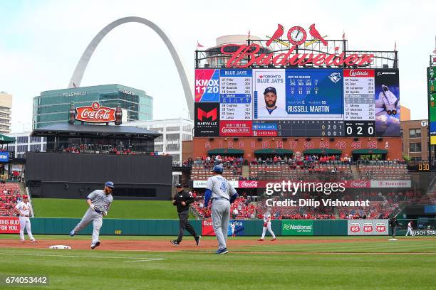 Russell Martin of the Toronto Blue Jays rounds third base after hitting a solo home run against the St. Louis Cardinals in the second inning at Busch...