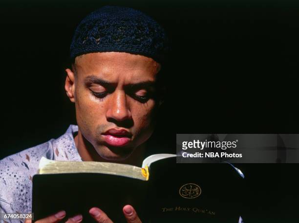 Mahmoud Abdul-Rauf of the Denver Nuggets reads the Quran circa 1995 in Denver, Colorado. NOTE TO USER: User expressly acknowledges and agrees that,...