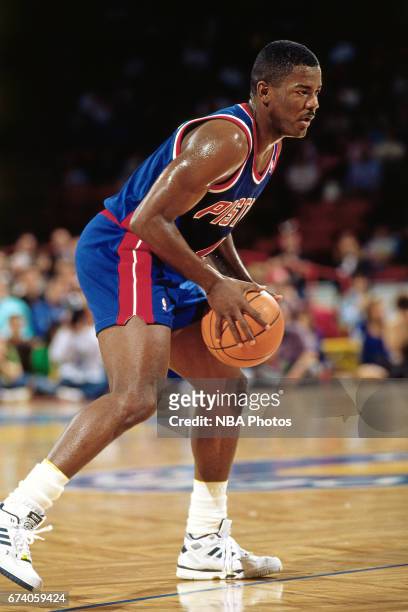 Joe Dumars of the Detroit Pistons dribbles against the Denver Nuggets circa 1994 at the McNichols Sports Arena in Denver, Colorado. NOTE TO USER:...