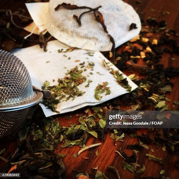 high angle view of herbs with teabag - jessa stock-fotos und bilder