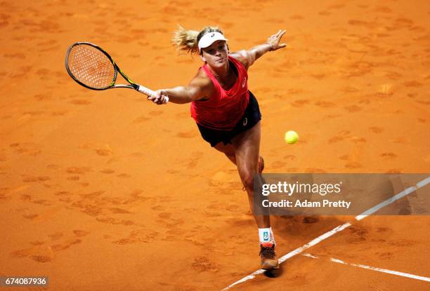 Coco Vandeweghe of the USA plays a backhand during her match against Karolina Pliskova of the Czech Republic during the Porsche Tennis Grand Prix at...