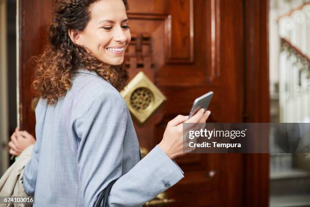 single, businesswoman getting ready in the morning. - leaving home stock pictures, royalty-free photos & images