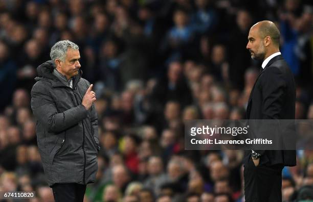 Jose Mourinho, Manager of Manchester United and Josep Guardiola, Manager of Manchester City during the Premier League match between Manchester City...
